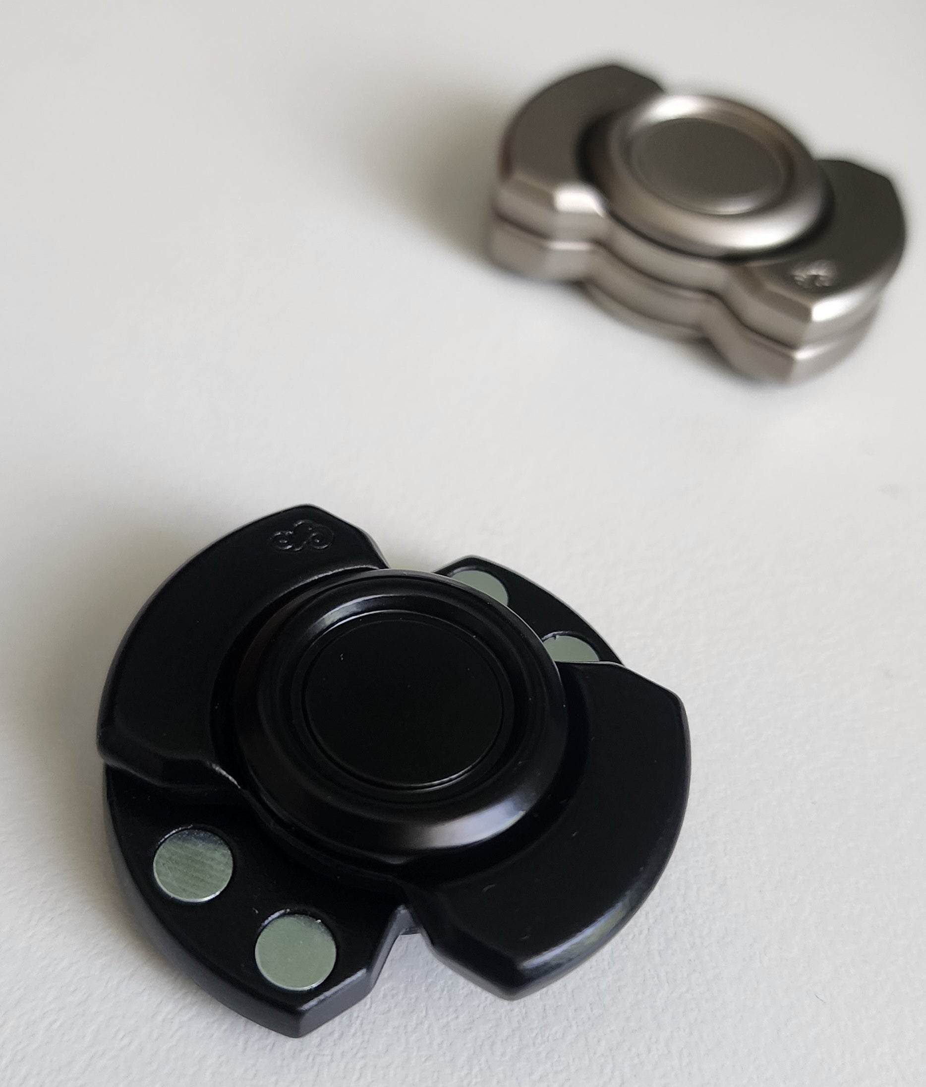 Magnetic Spin, Click & Glide Fidget – Metal Slider Disc (Black & Silver)