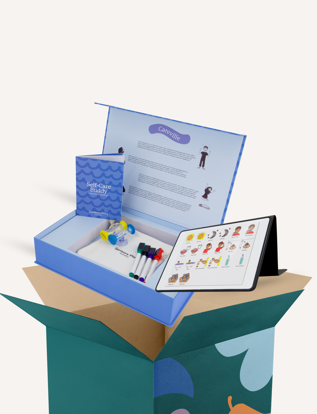 An open blue gift box displaying a children's activity or craft kit, including a tablet with character illustrations, small markers, and printed instruction sheets, set against a clean off-white background.