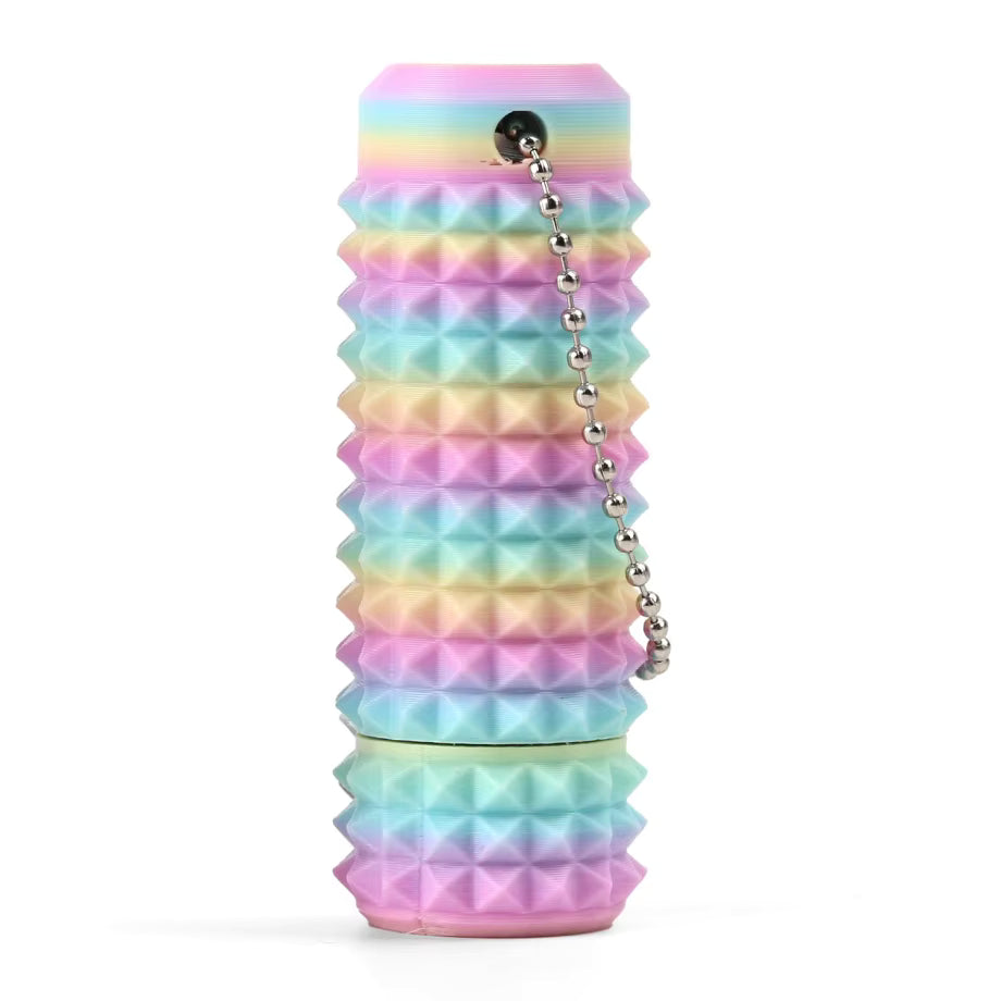 Colourful textured keychain spiked cylindrical fidget spinner on a white background