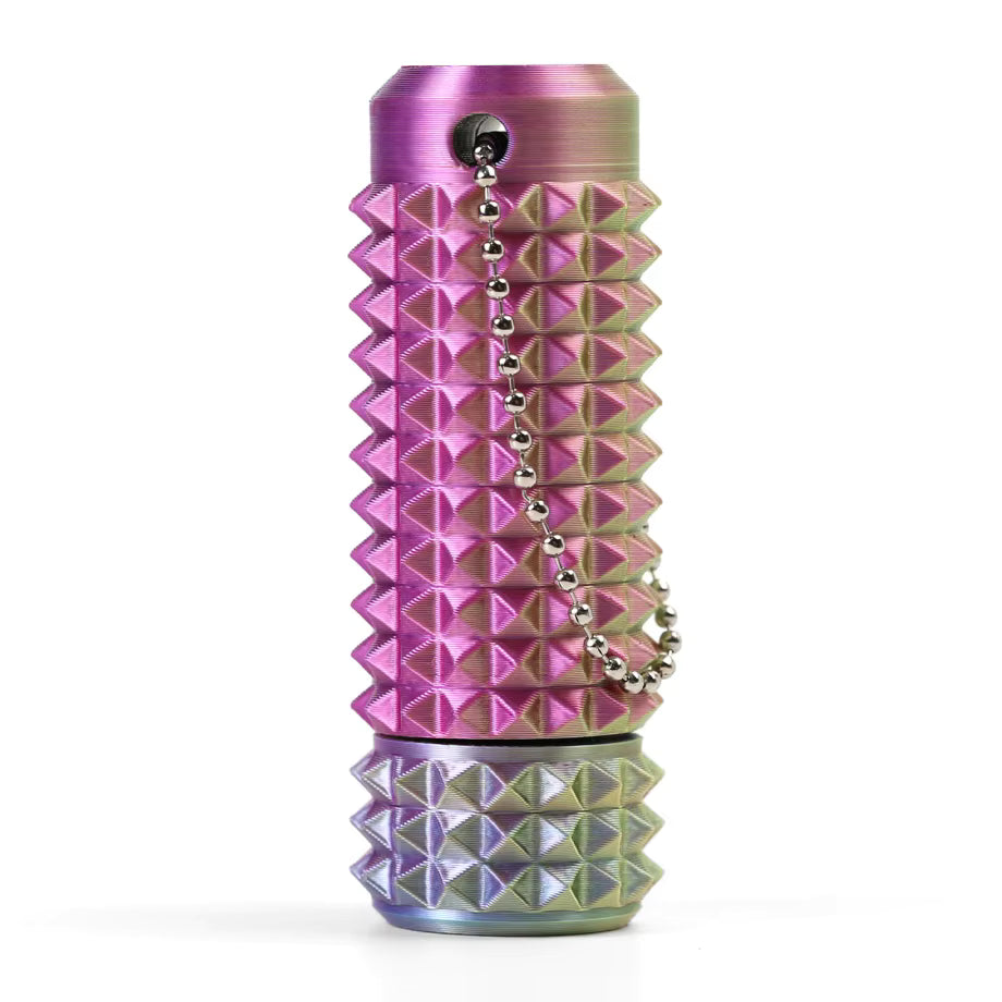 Multicolored spiked cylindrical fidget spinner on a white background