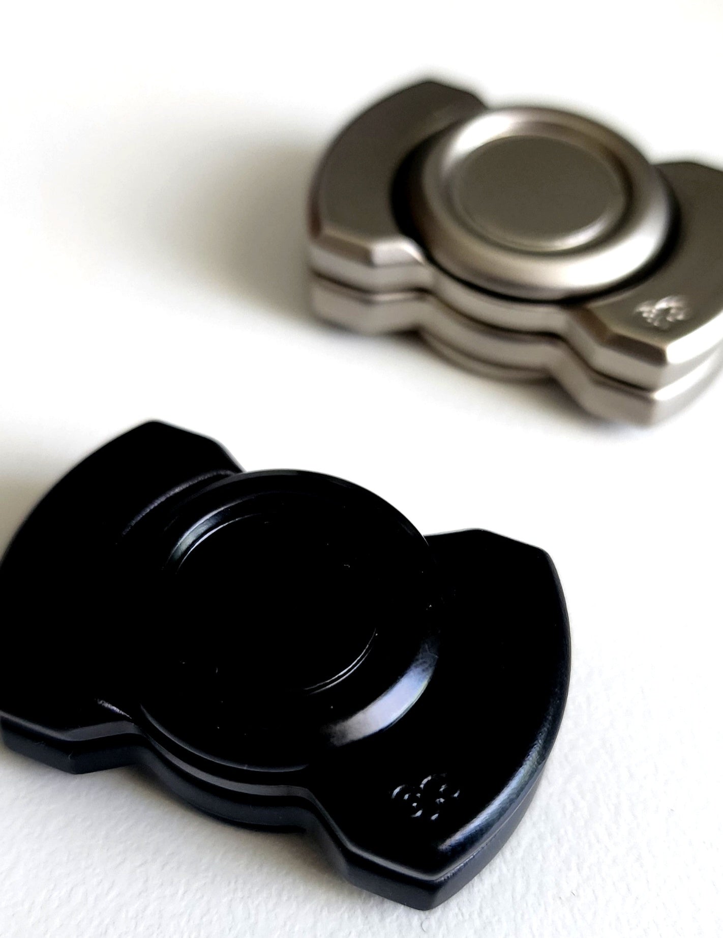 Magnetic Spin, Click & Glide Fidget – Metal Slider Disc (Black & Silver)